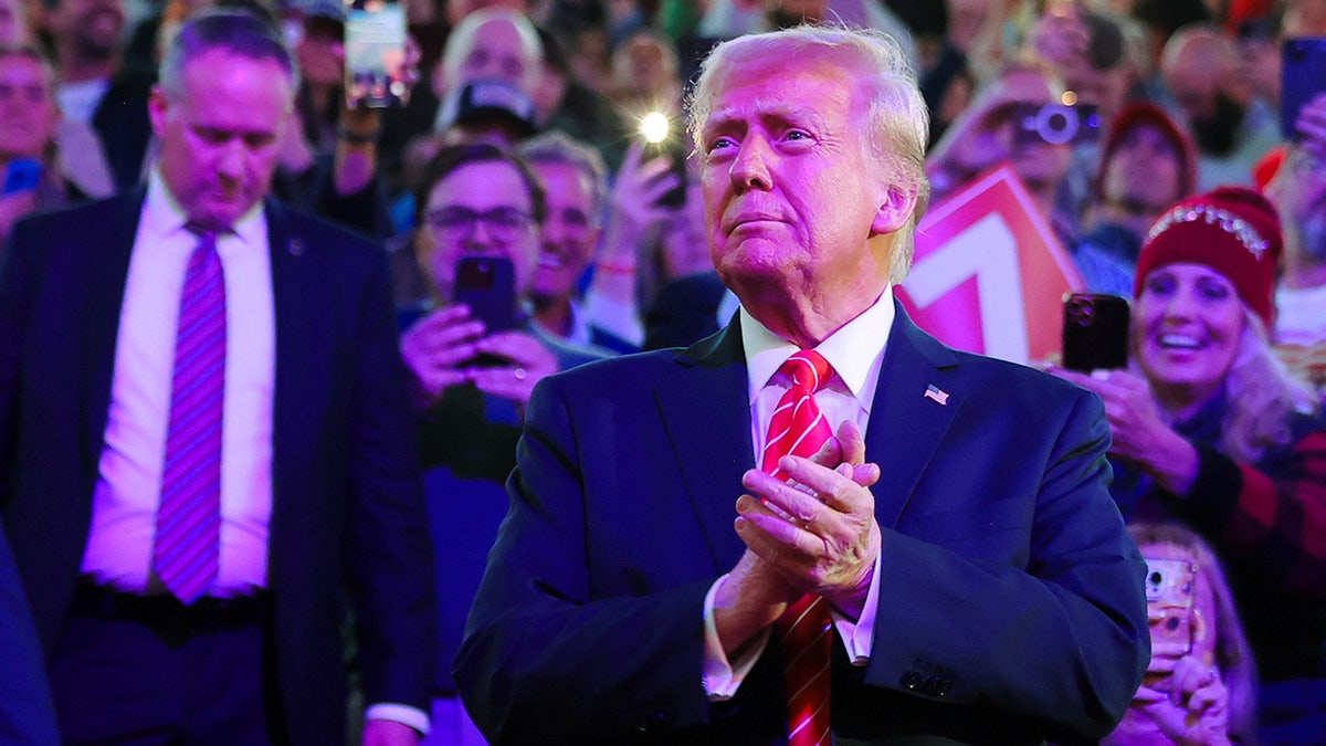 Donald Trump arrives to attend a rally the day before he is scheduled to be inaugurated