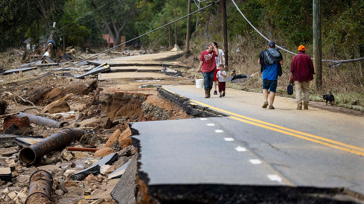 north carolinians walks along helene devastation