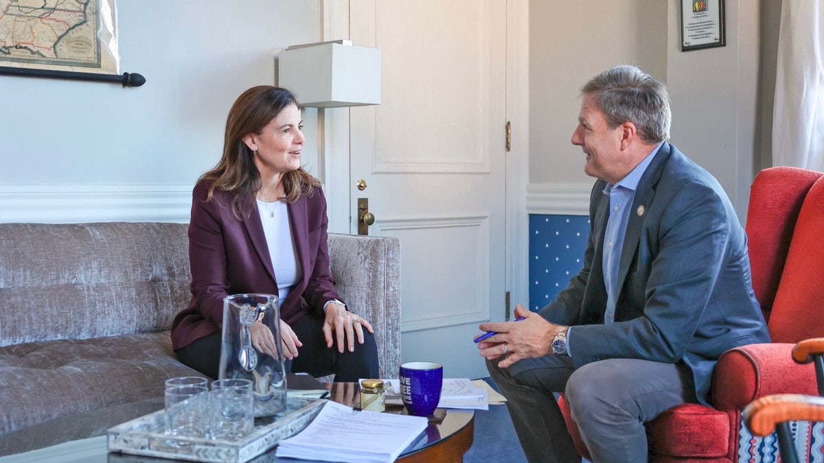 Gov.-elect Kelly Ayotte, left, and Gov. Chris Sununu meet in the New Hampshire governor's office at the State House in Concord, N.H., on Nov. 7, 2024.