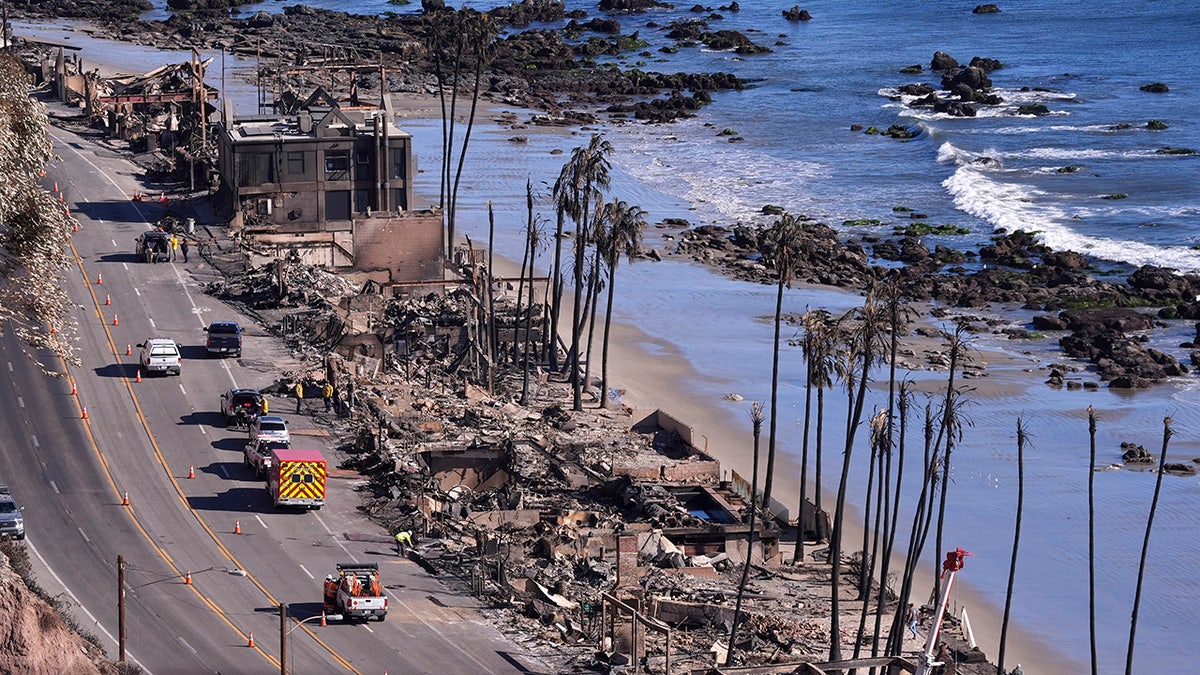 Homes along Pacific Coast Highway are seen burn out from the Palisades Fire