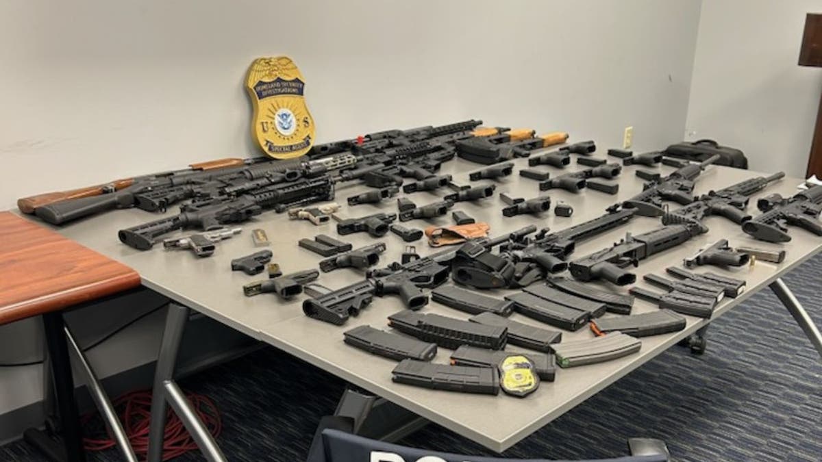 guns on display on a table