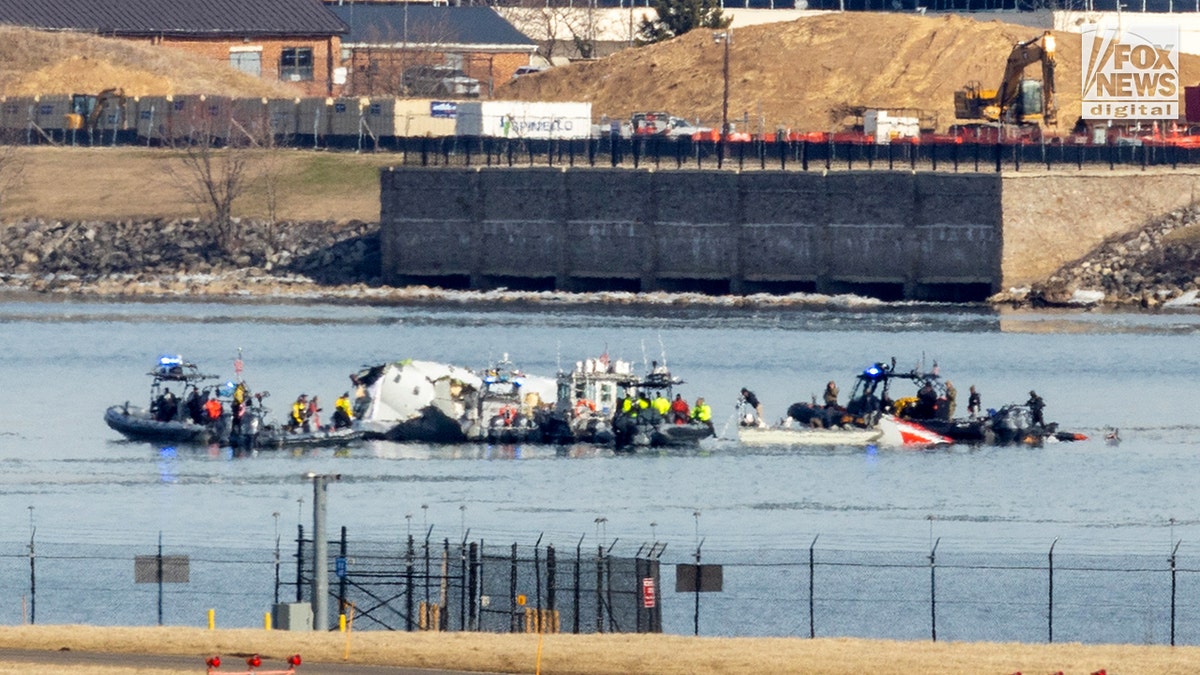 Search efforts in DC after a collision between an American Airlines jet and a U.S. Black Hawk helicopter