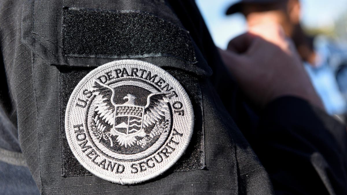 A member of ICE and ERO Fugitive Operations teams is pictured during an operation in San Jose