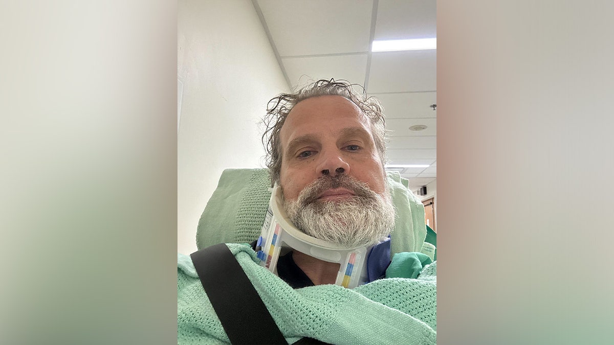 Nate Richie receives medical treatment after surviving a Delta Air Lines plane crash