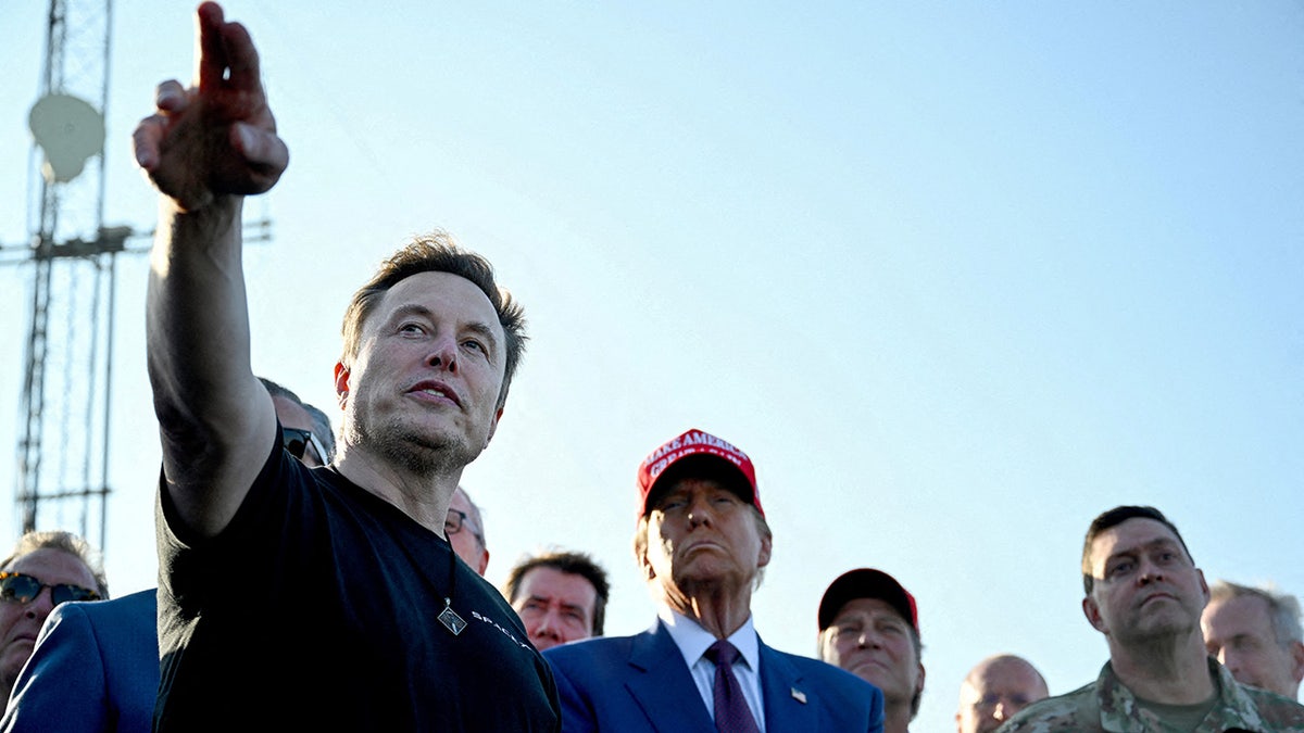 Elon Musk speaks with U.S. President-elect Donald Trump and guests at a viewing of the launch of the sixth test flight of the SpaceX Starship