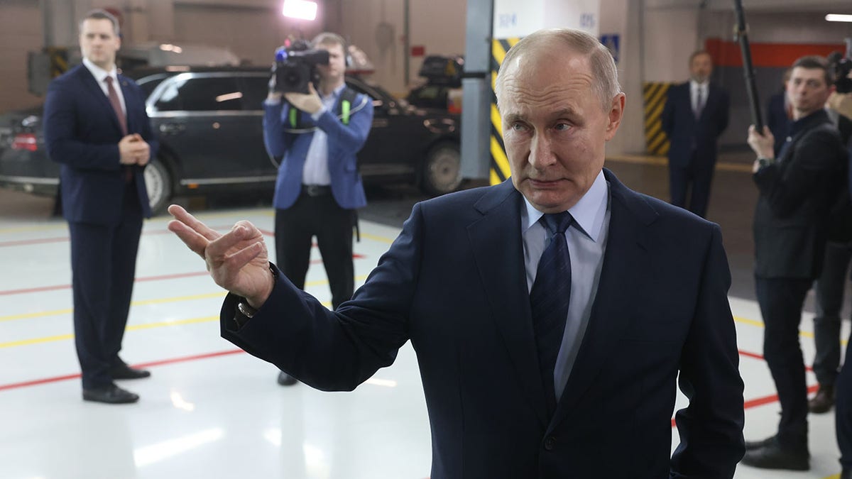 Putin during auto plant visit in Russia