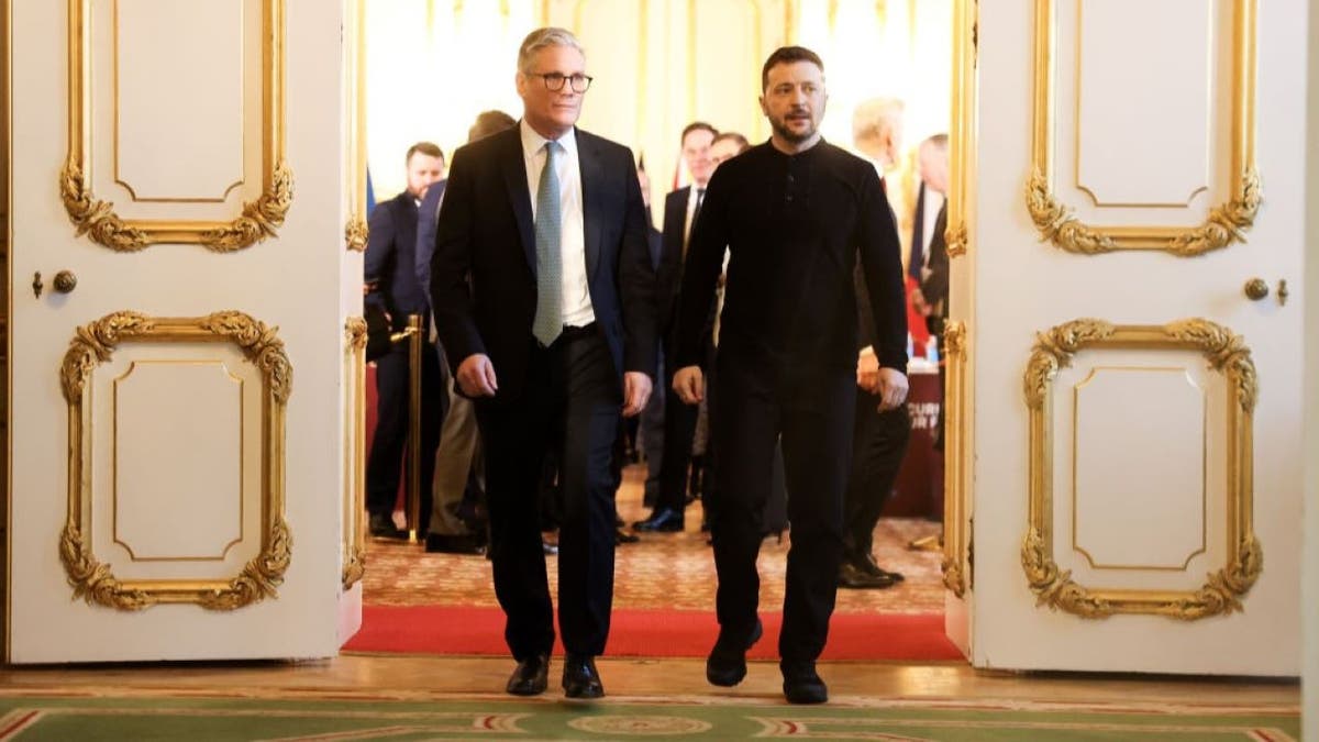 LONDON, UNITED KINGDOM - MARCH 02: (----EDITORIAL USE ONLY - MANDATORY CREDIT - 'SIMON DAWSON / NO 10 DOWNING STREET / HANDOUT' - NO MARKETING NO ADVERTISING CAMPAIGNS - DISTRIBUTED AS A SERVICE TO CLIENTS----) British Prime Minister Keir Starmer walks with Ukrainian President Volodymyr Zelenskyy as he hosts a European Leaders Summit at Lancaster House in London, United Kingdom on March 02, 2025. (Photo by Simon Dawson/No 10 Downing Street / Handout/Anadolu via Getty Images)