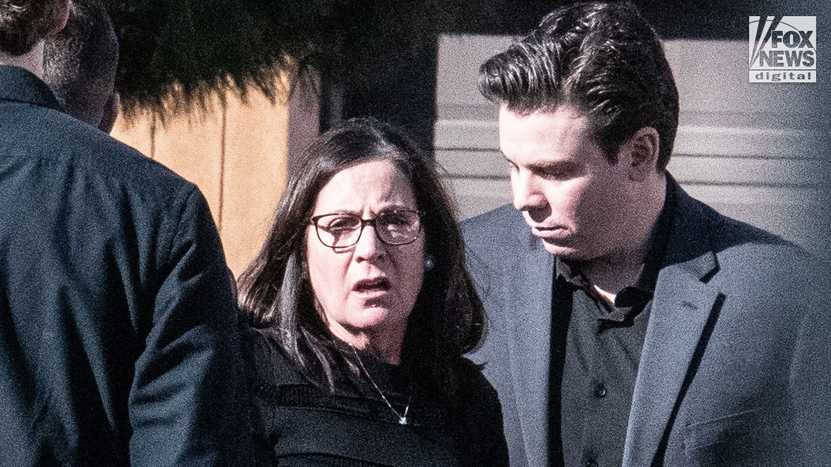 David Hertgen Jr., and his mother, Debra Hertgen at the wake for Joseph Hertgen who is alleged to have beaten to death by his brother Matthew Hertgen to death with a golf club